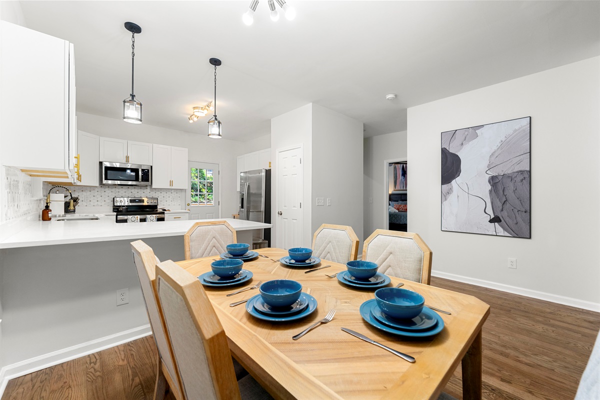 Share delicious meals and great conversations around this modern dining table.