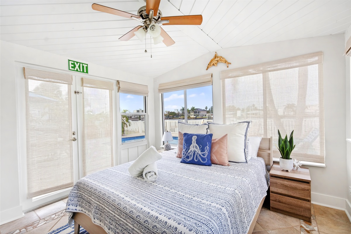 Enjoy tranquil waterviews and a queen bed in bedroom one.