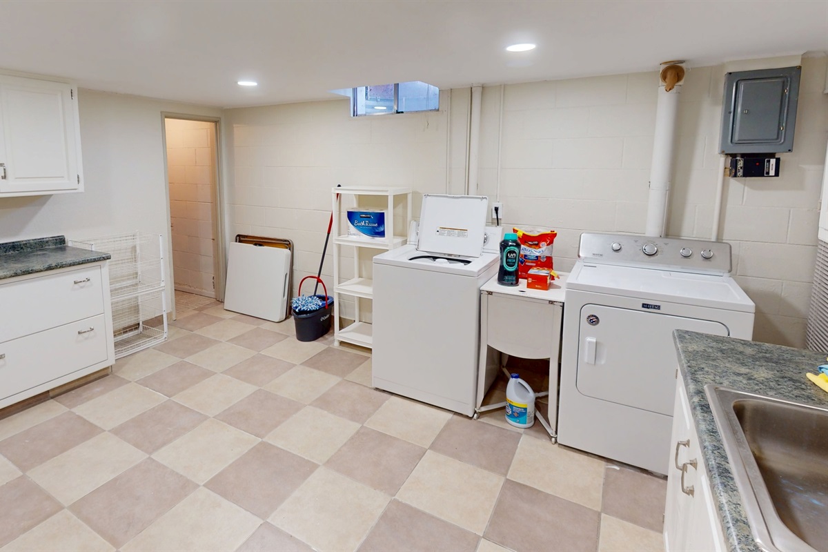 Laundry Room with storage in multiple cabinets 
