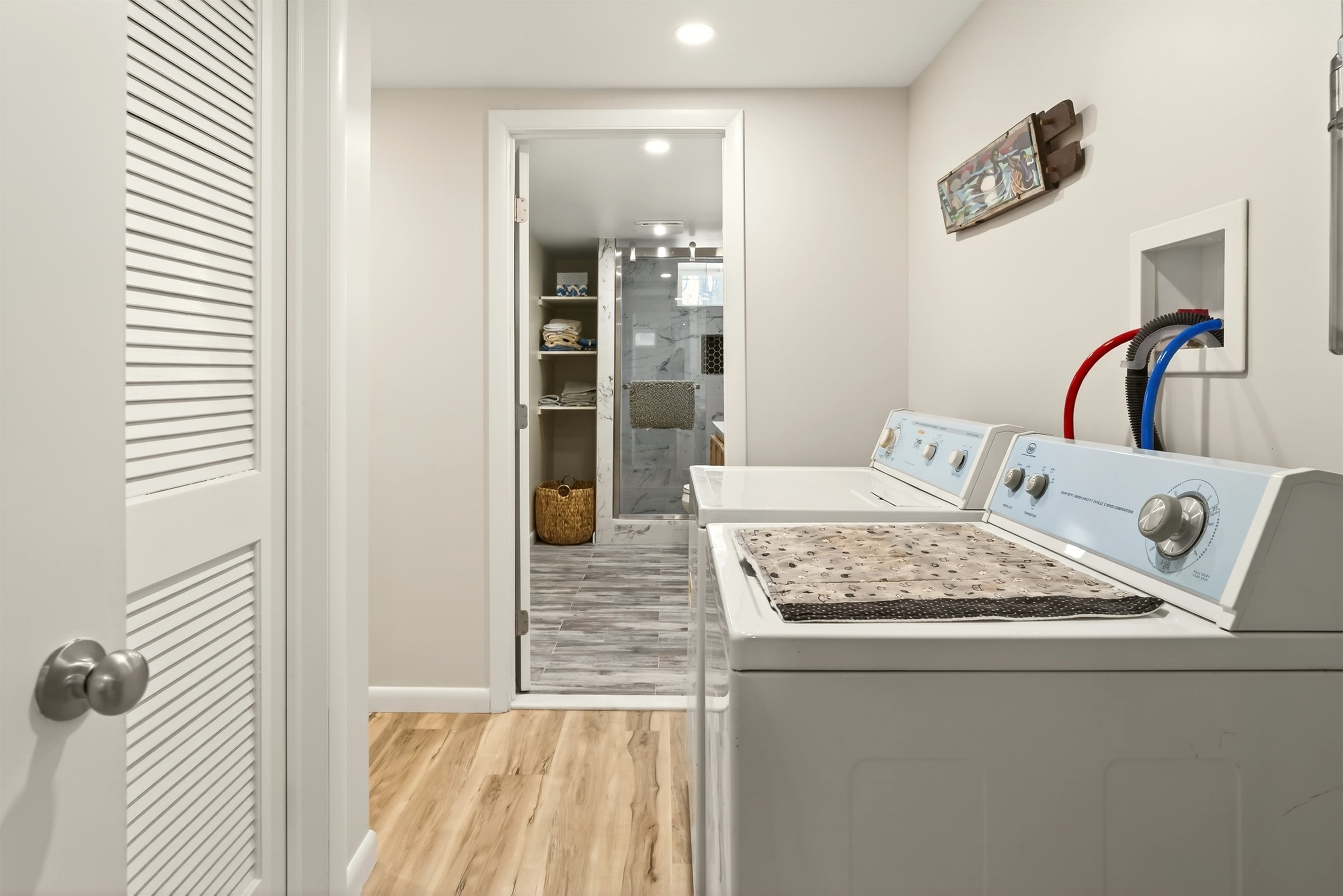 Lower level hall to laundry and full bathroom