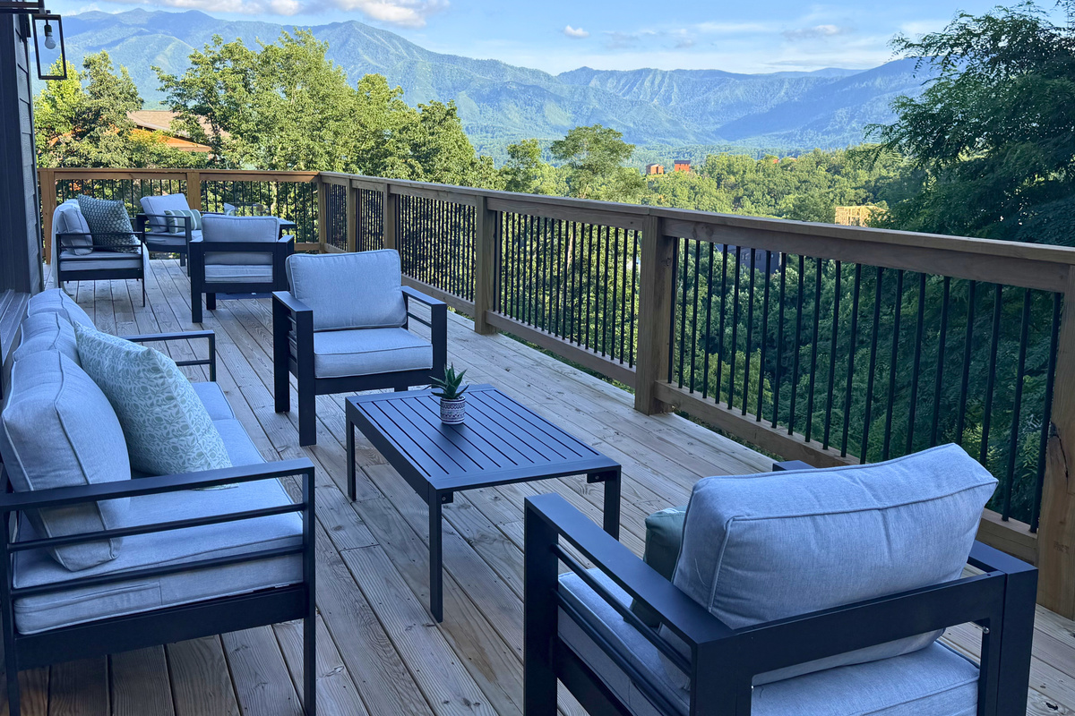 Sink into the deck lounge with the Smokies, and Mt. LeConte, stretched out in front of you.