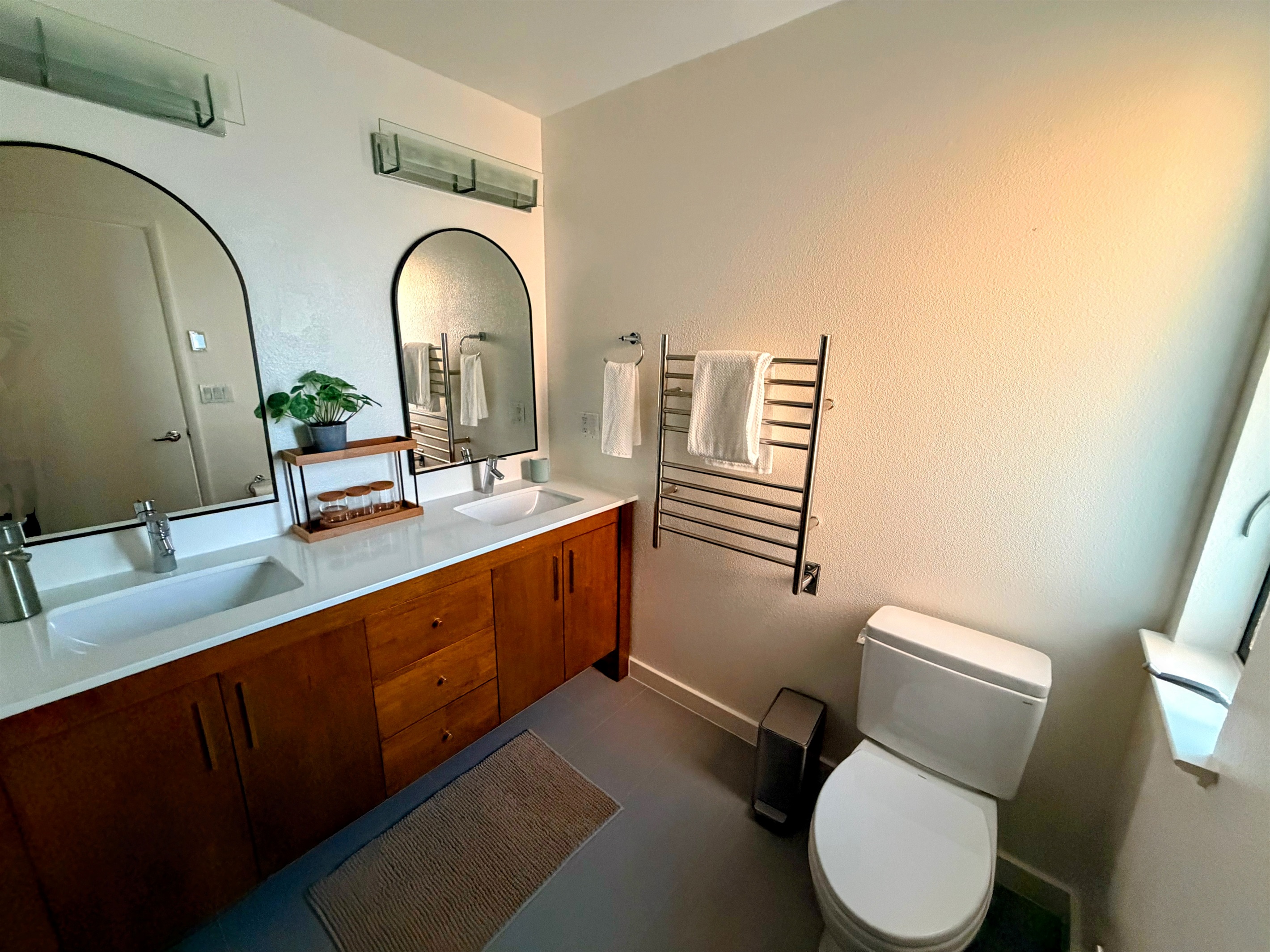 Primary ensuite with dual vanity.