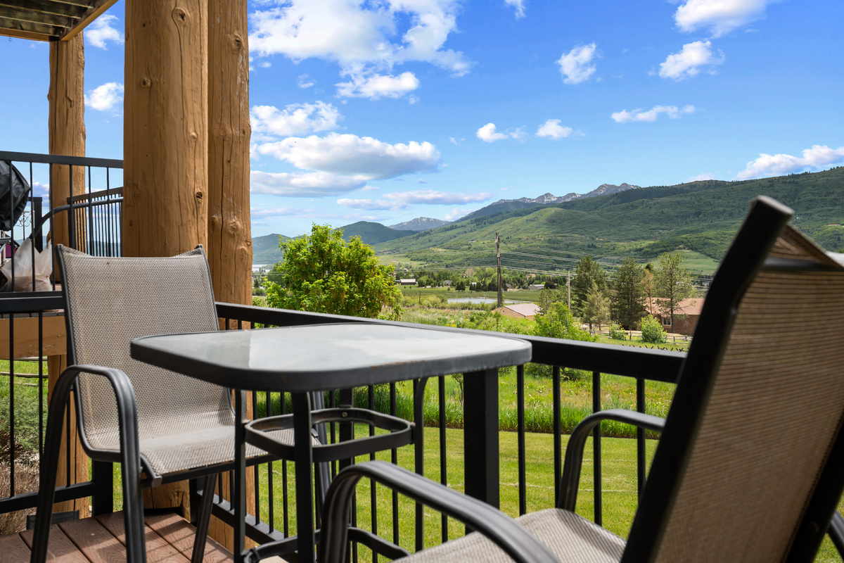 Sip your morning coffee or unwind in the evening while taking in beautiful mountain and valley views from the private balcony.