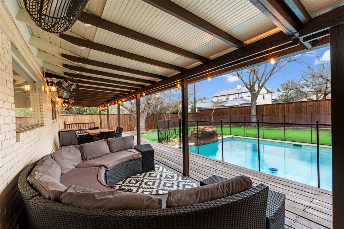 Unwind in style—plush outdoor seating, string lights, and poolside views make this the ultimate hangout spot.