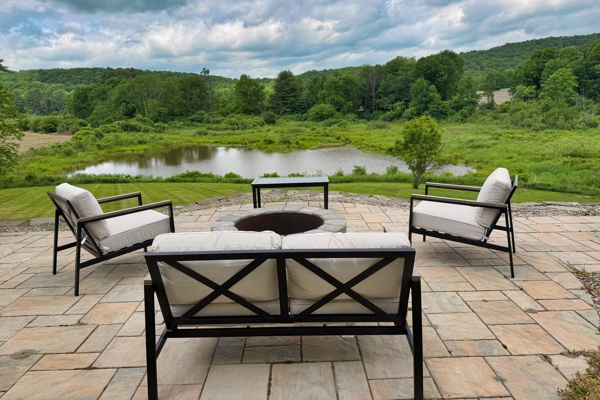 Outside seating around the wood burning fire pit the views are spectacular.