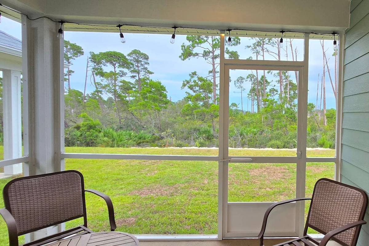 Comfortable Screened in Porch. 