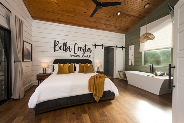 Perfect for couples — elegant master suite with a soaking tub steps from your plush king bed.