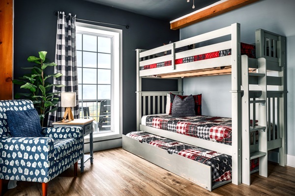 A different angle of secondary bedroom #1 in the basement. That big window look out straight to the mountain view - Sleeps 3.