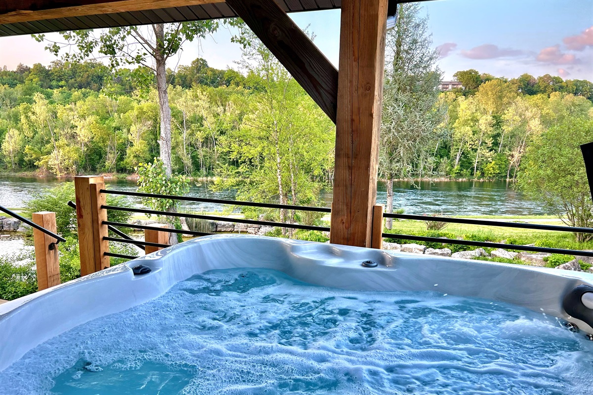 Relax for a while in the hot tub overlooking the lake!
