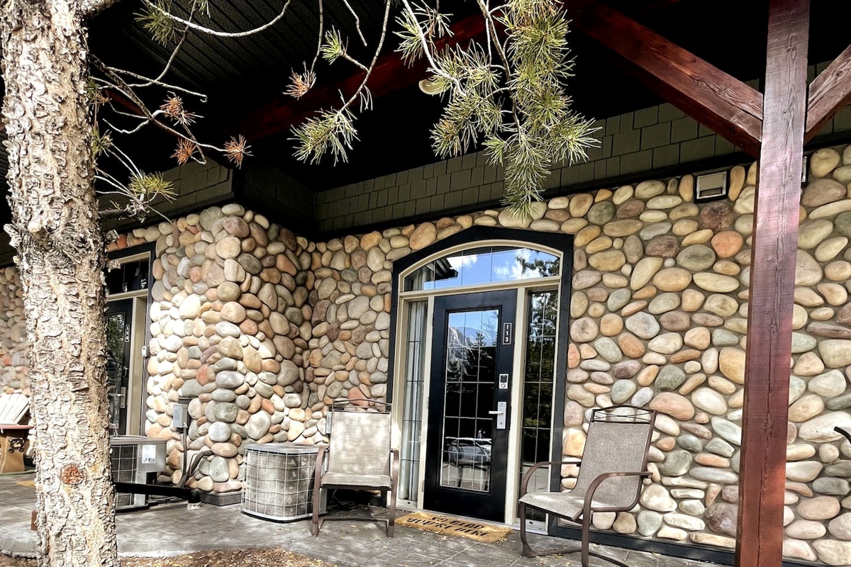 Relax on your patio with private entrance and view of the mountains.