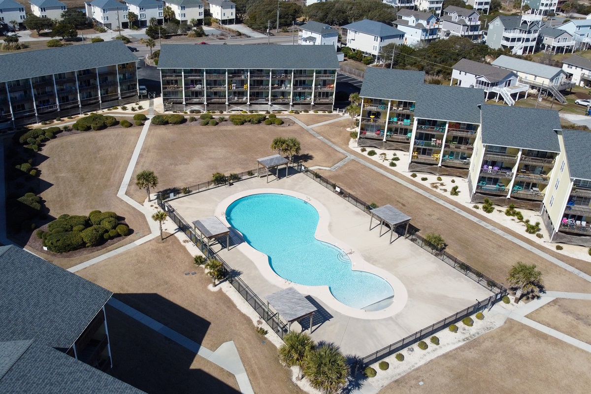 Aerial of the Surf Condos pool and surrounding buildings