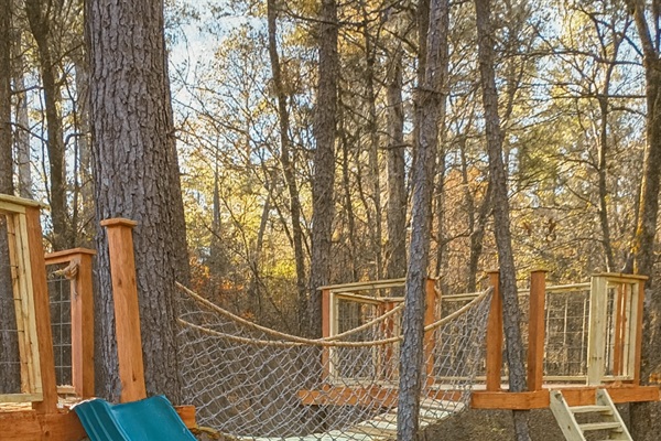 Let little adventurers climb, slide, swing, and sneak across the rope bridge, and spend the afternoon in their own treetop fort among the pines. 