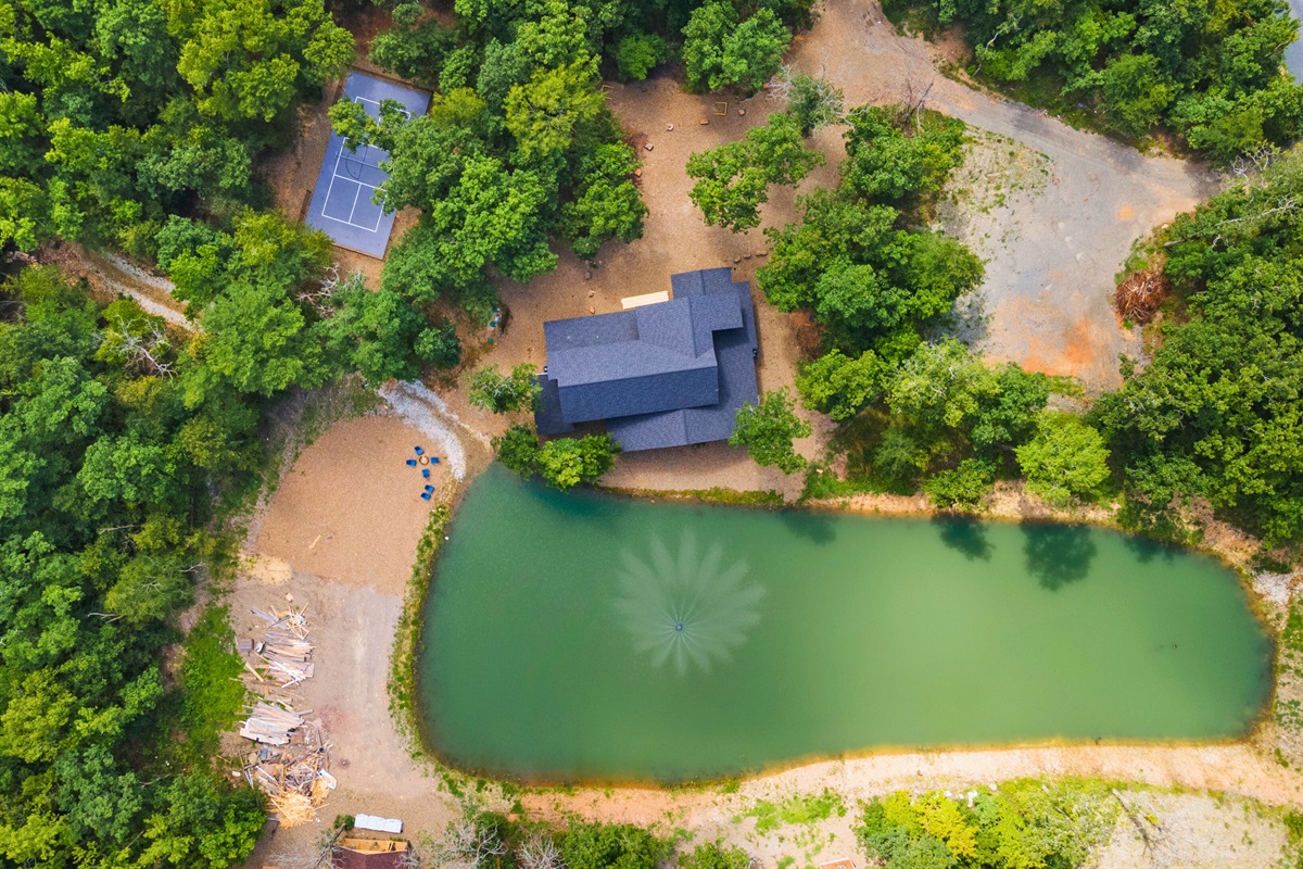 A bird's-eye view of your next adventure spot – surrounded by forest, this is where peace meets play, and relaxation is on the itinerary