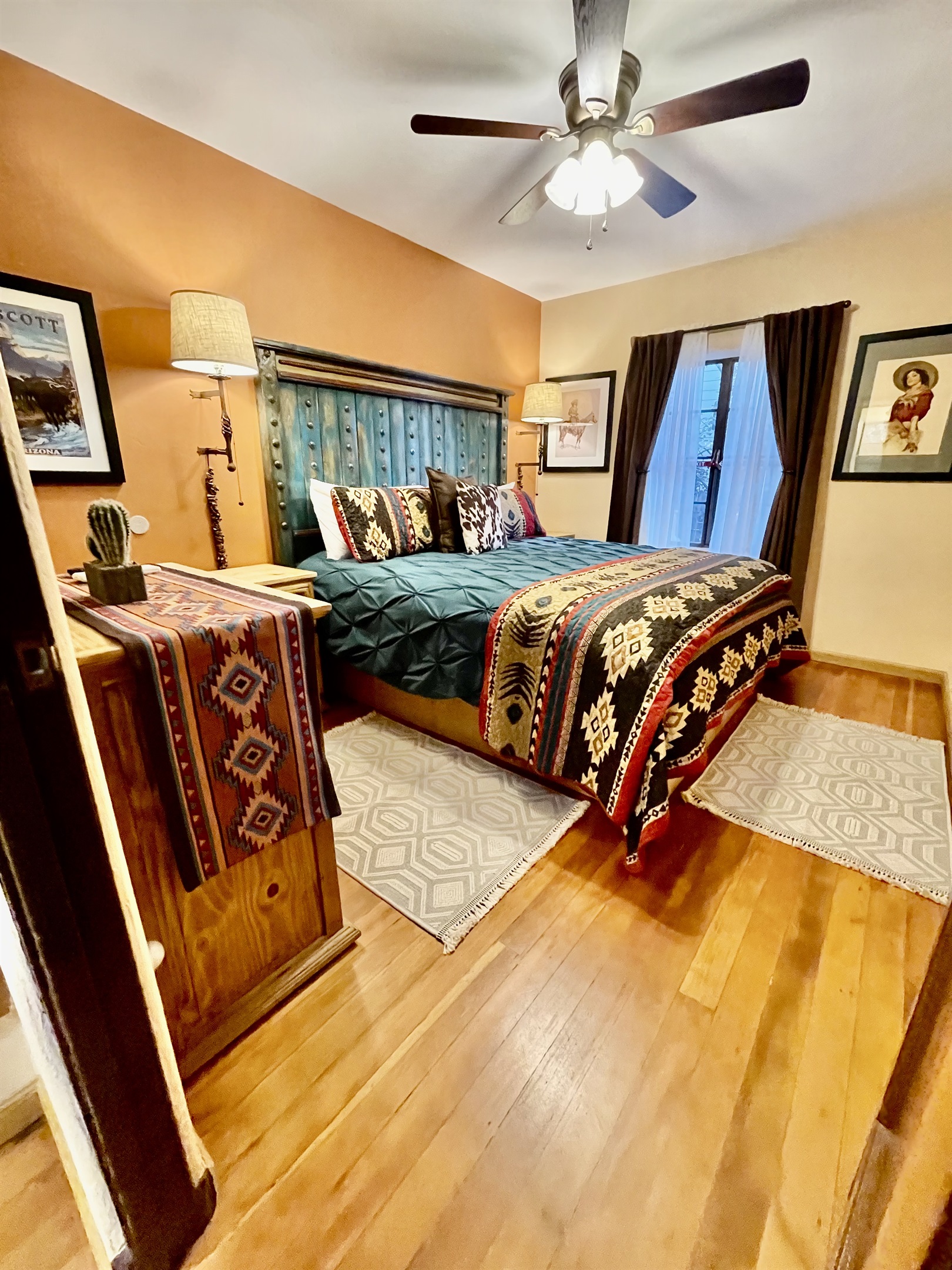 Wake up to garden views in this cozy king bed with southwestern charm.