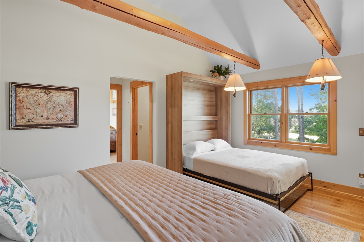 Bedroon 1, Spacious king master bedroom with queen Murphy bed and private outdoor access.