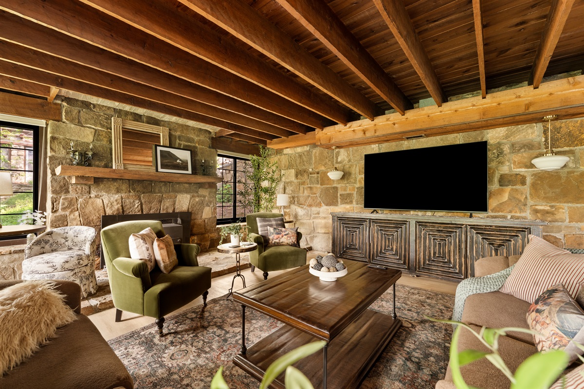 Cozy up for movie night with rustic charm all around.