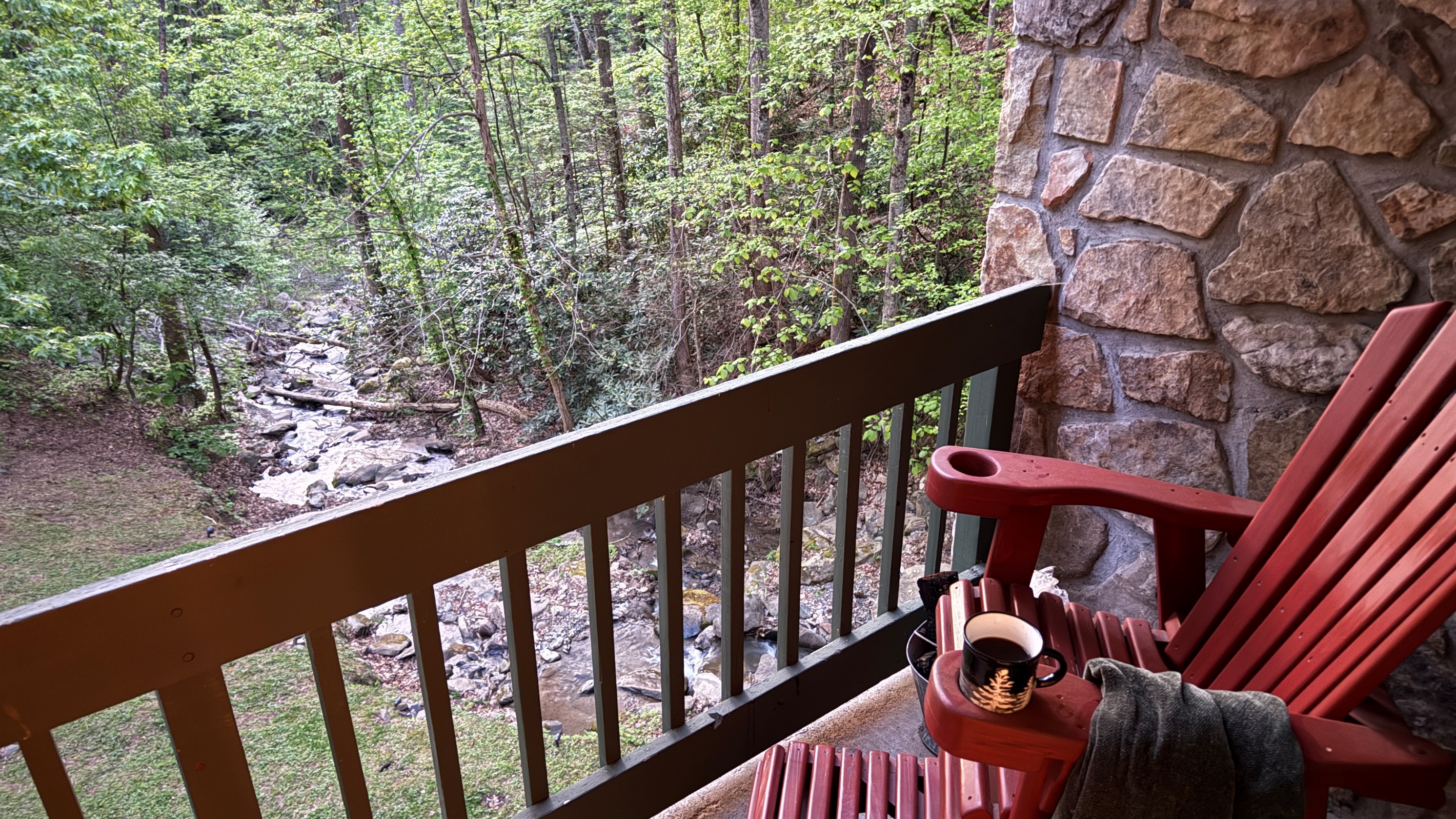 The tall glider adirondack chairs on the balcony will be your favorite place to enjoy your morning coffee while the sounds of creek below soothe your mind.   Watch out for bear coming to enjoy the creek.