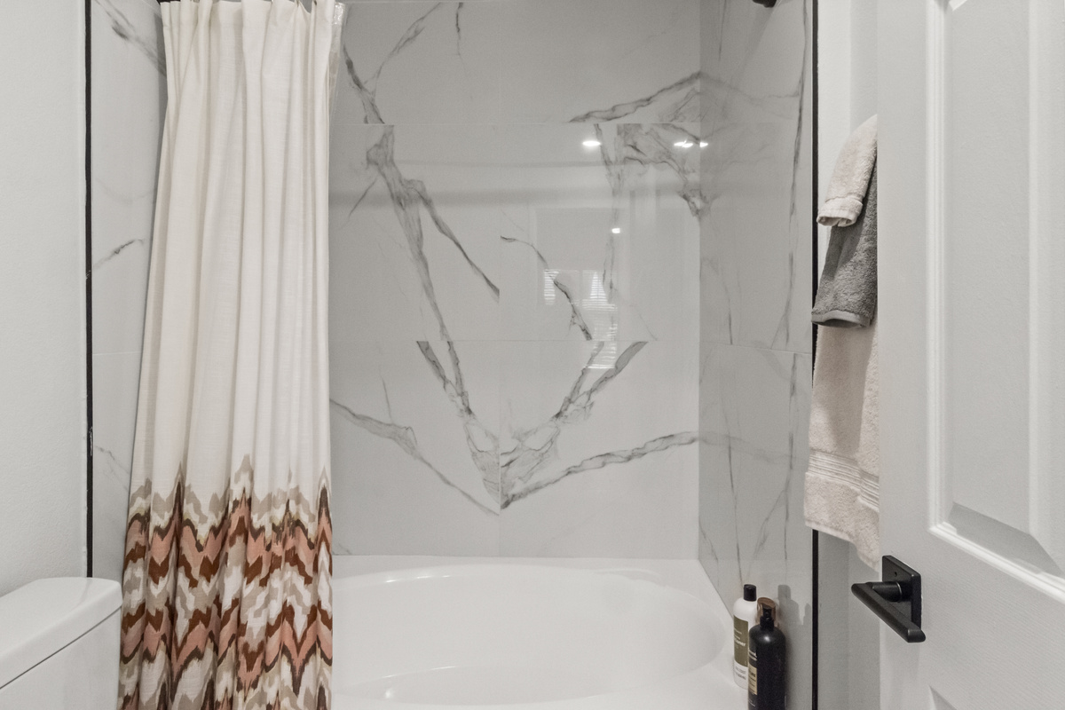 Spacious bathroom designed for comfort and convenience.