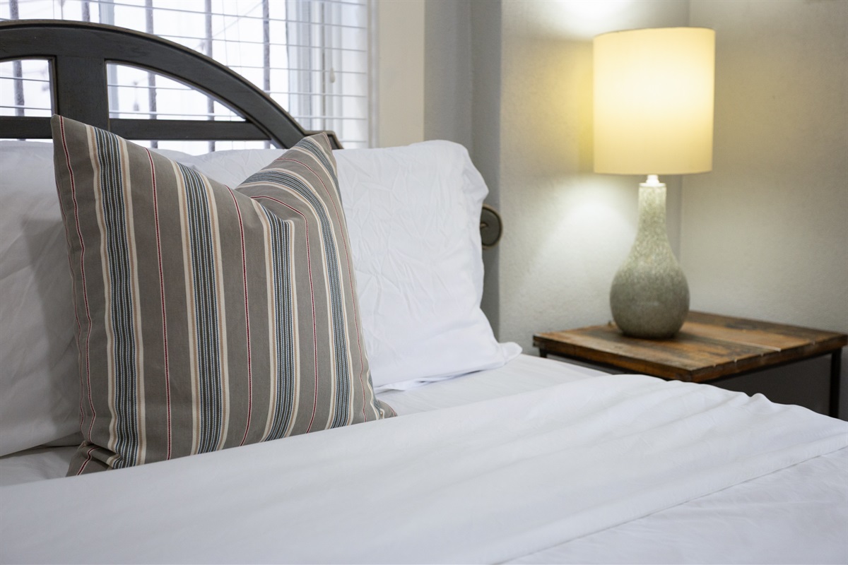 Plush pillows to sink into after a long Savannah day.