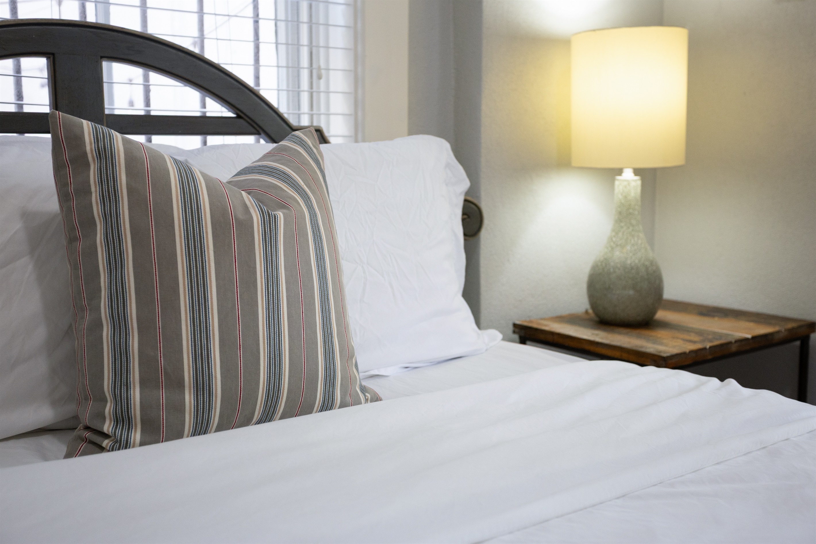 Plush pillows to sink into after a long Savannah day.