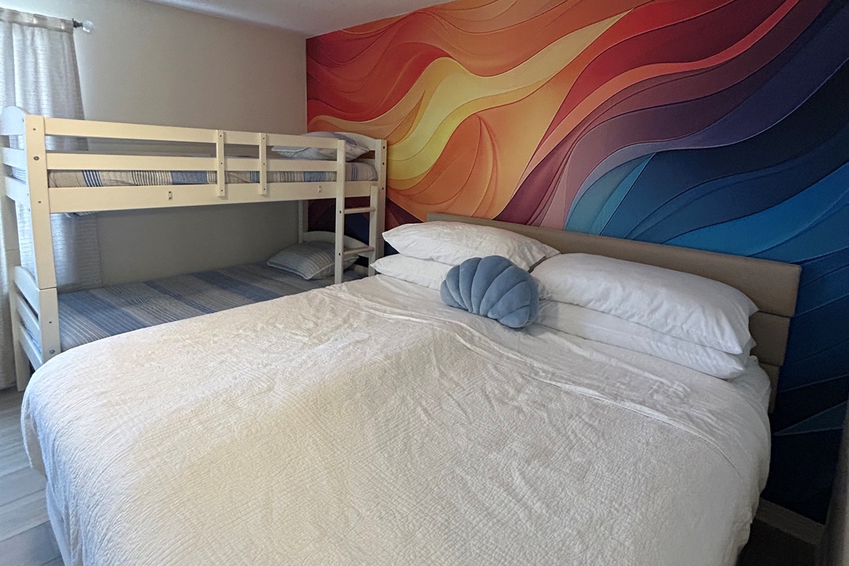 Second bedroom with a King bed and a twin over twin  bunkbed on second floor