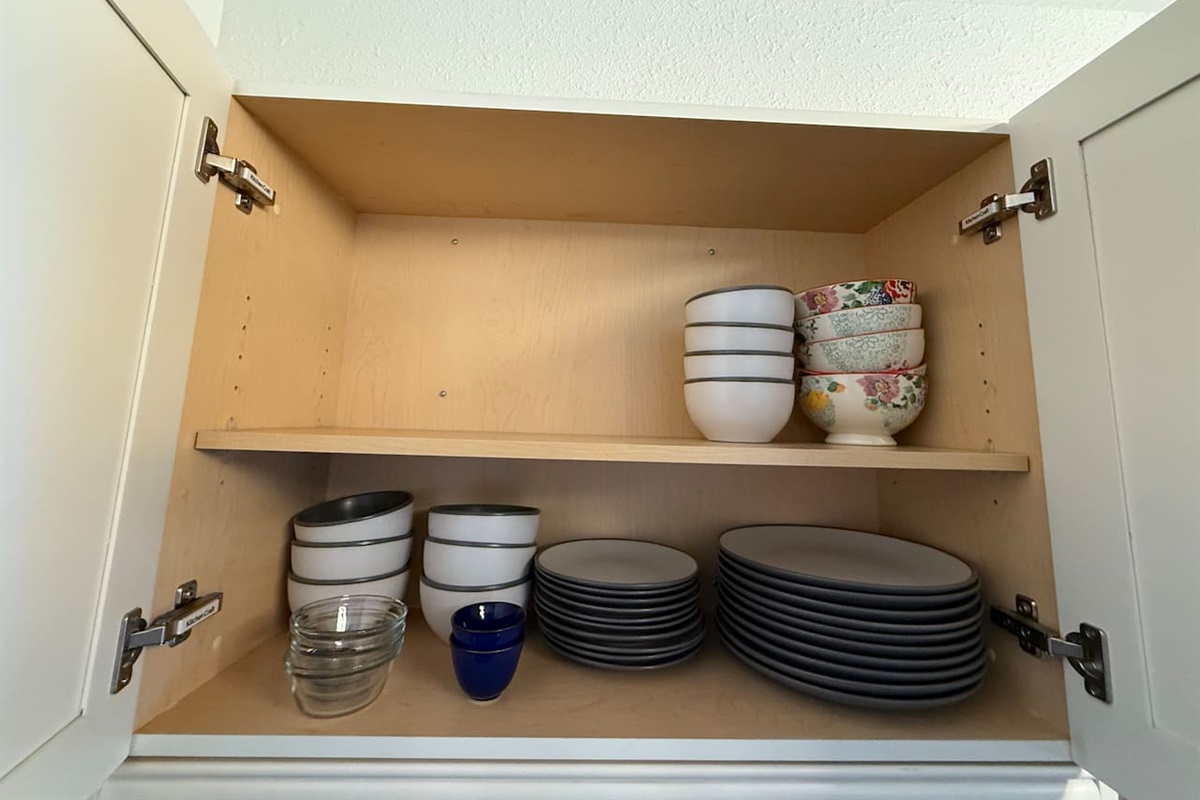 Dishware & Glassware: Ample supply of dishes, glasses, and mugs stored in easy-to-reach cabinets, ready for your group's stay.
