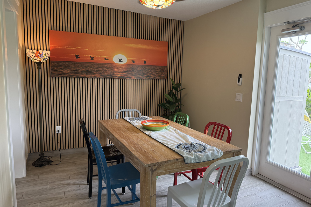 View from Dining Room to Livingroom and Bathroom of Pelican Suite at AMI Beach Lagoon