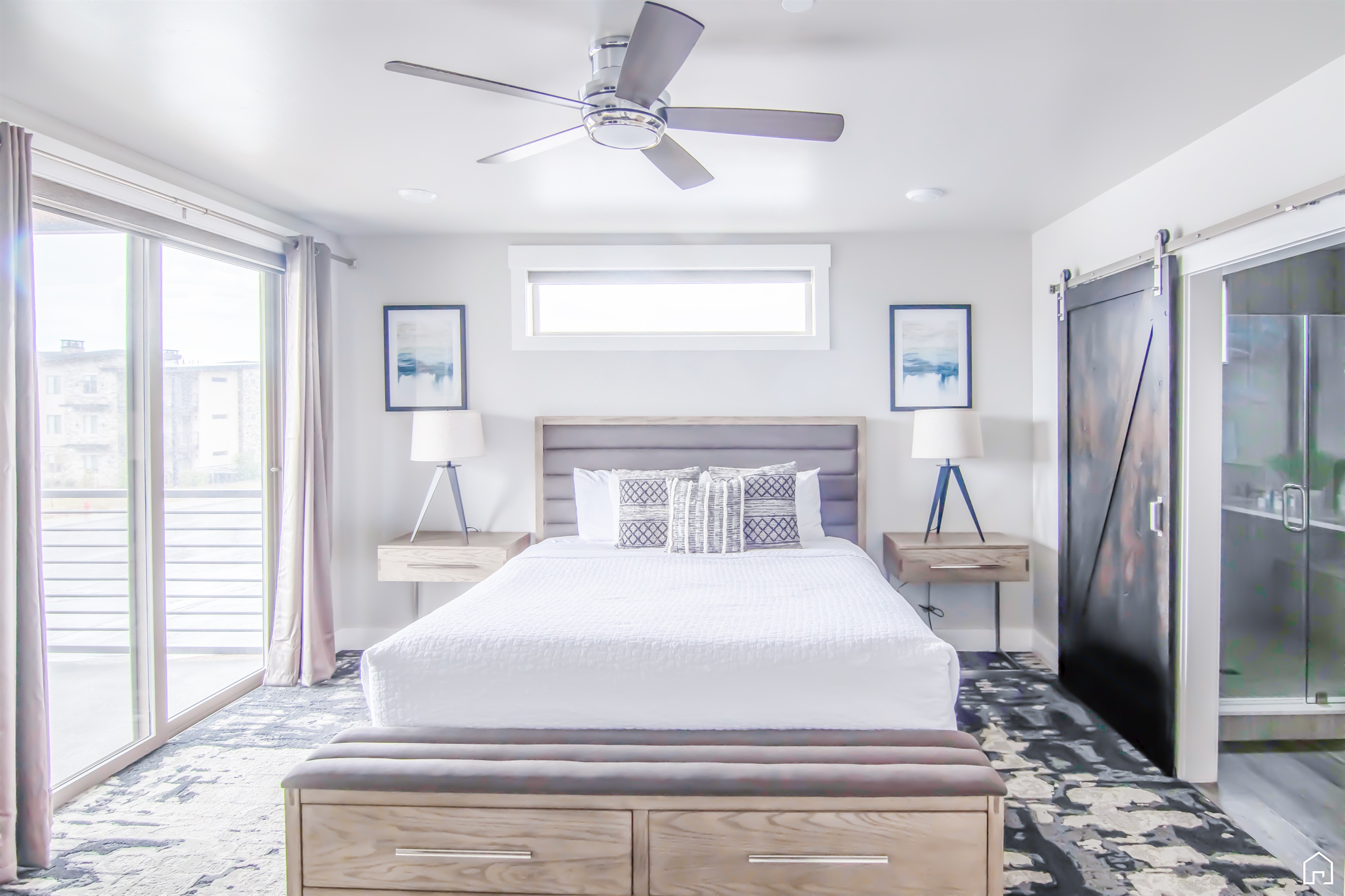 Master bedroom with ensuite bathroom and king bed