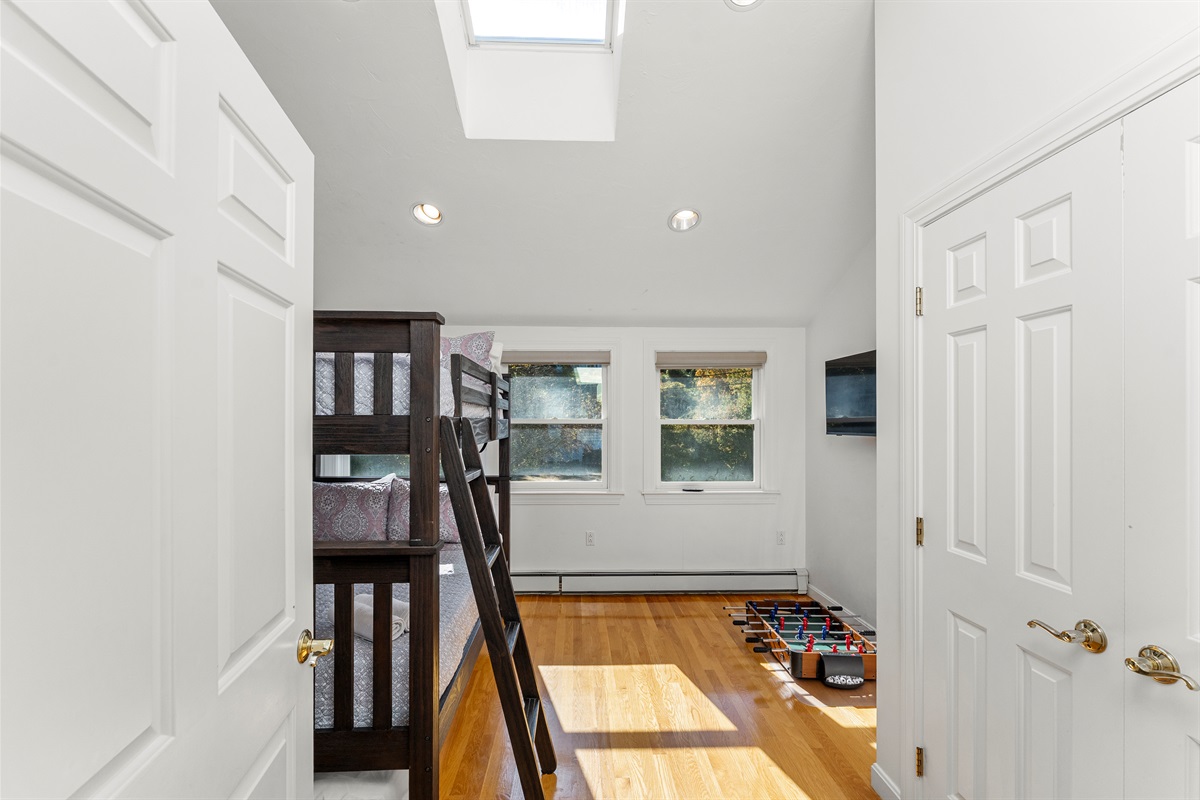 Kids will love the bunk bed in this playful bedroom.