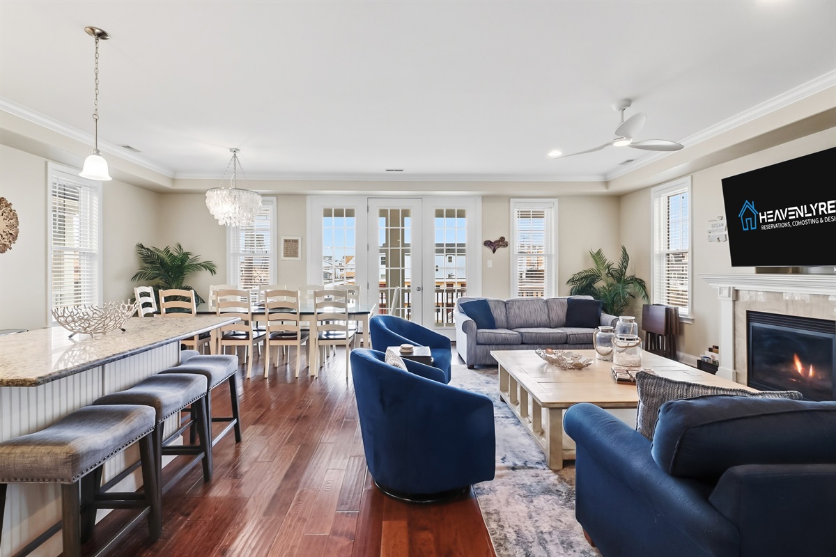 Spacious open-concept living and dining area with coastal charm