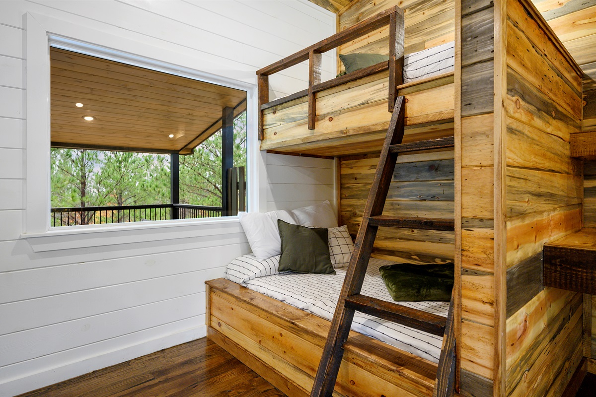 Built in bunks and cabin sleepover vibes done right. 
Perfect for kids, and late night storytelling after a full day of arcade battles and game room fun upstairs.
