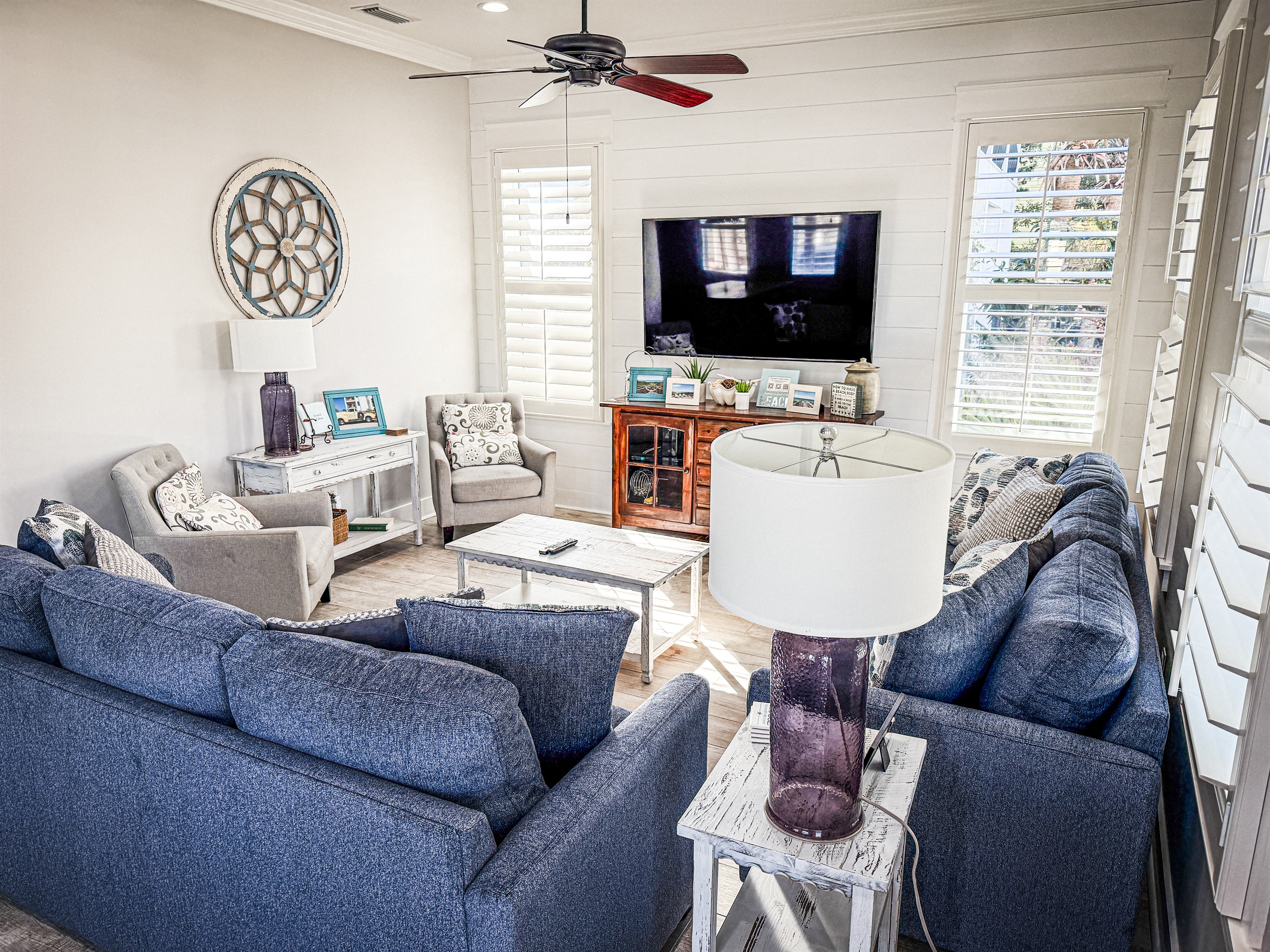 Spacious and inviting living room with generous seating, smart TV, and dedicated guest Netflix access.