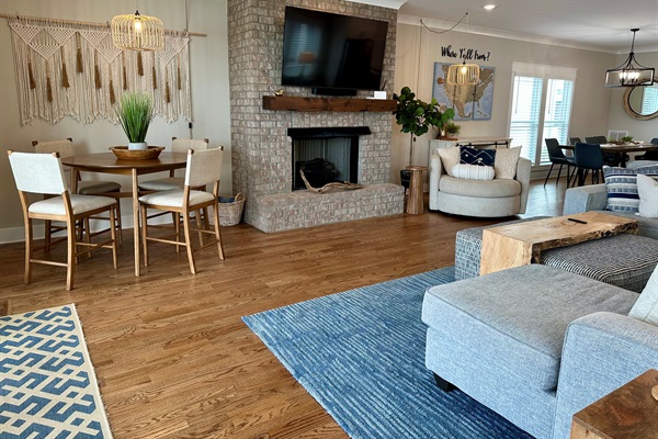 Seating for four and  65 inch Smart TV