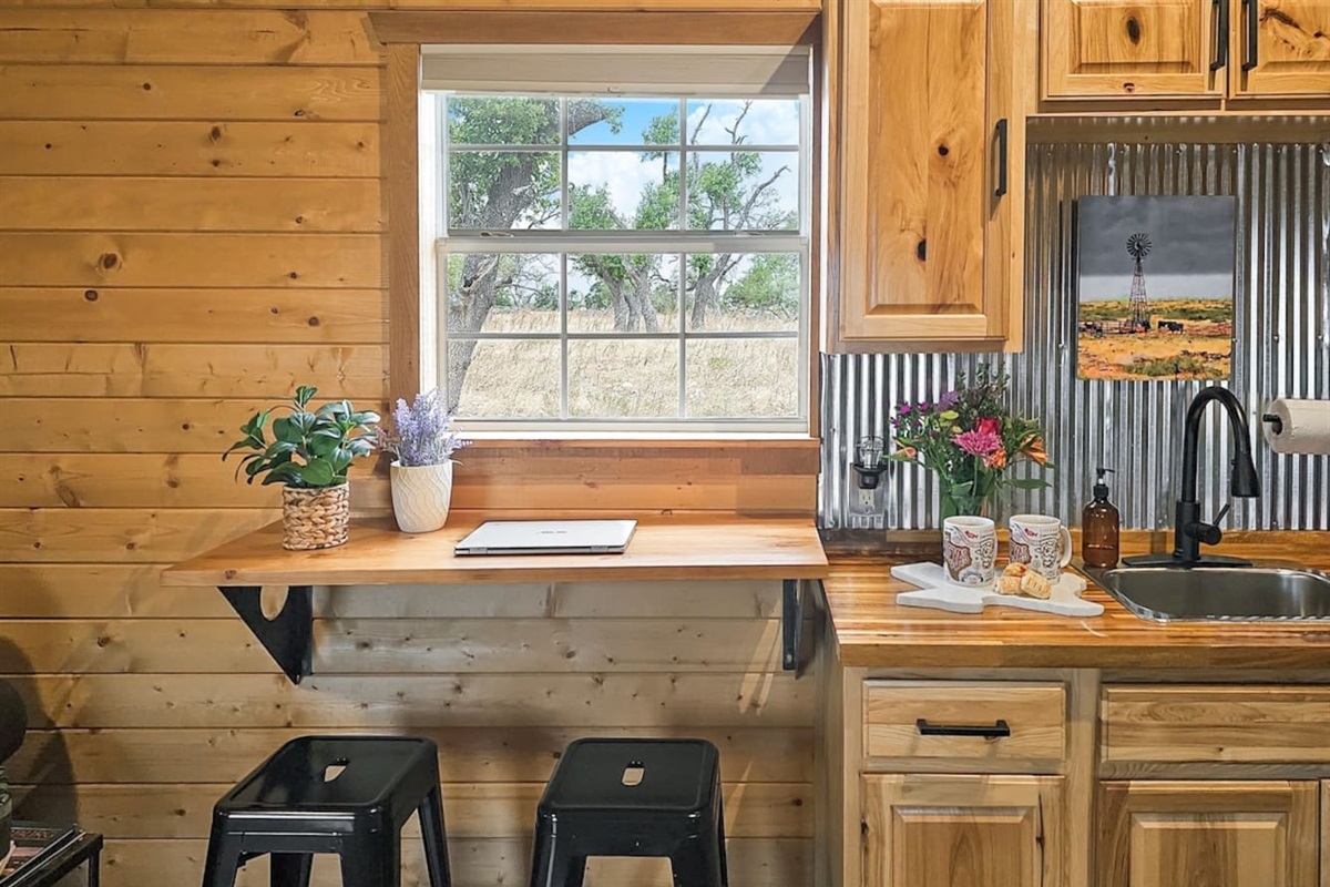 Enjoy your morning coffee or a quick bite at this quaint breakfast bar, with a view of the serene Texas landscape right outside.