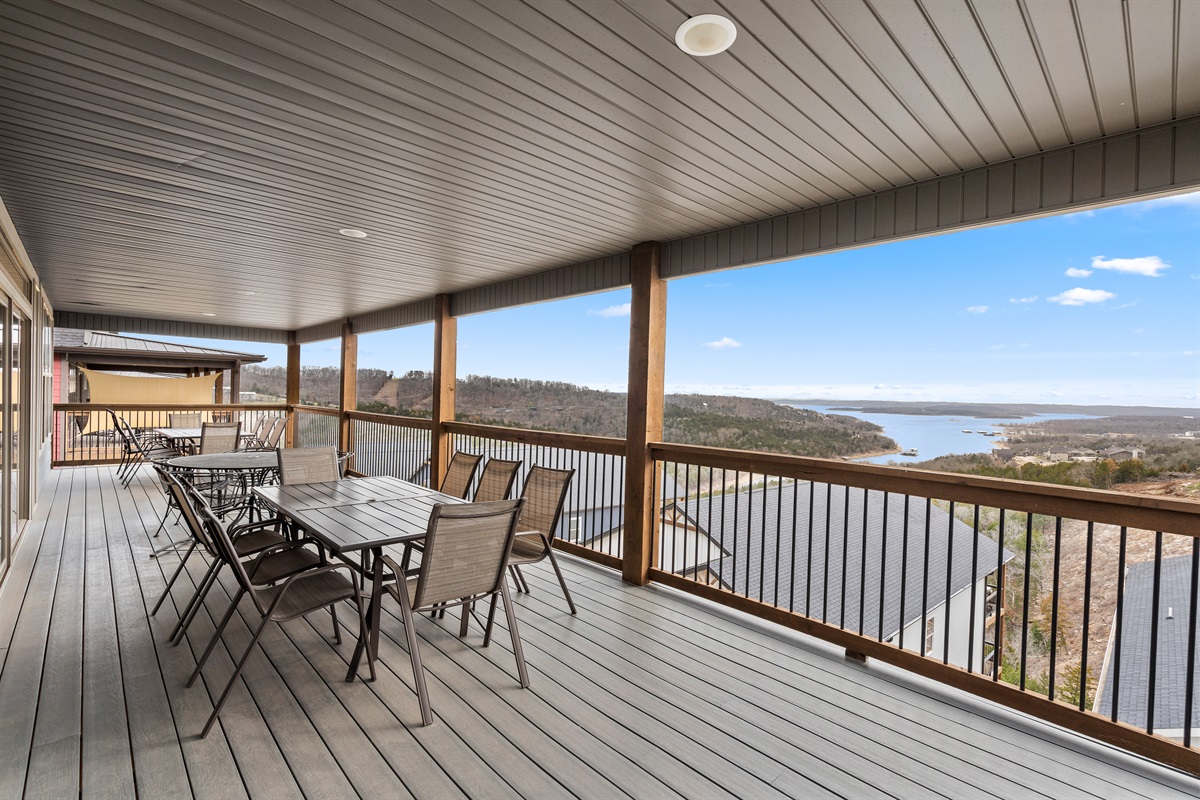 Spacious deck with dining seating and breathtaking views—ideal for outdoor meals and gatherings!