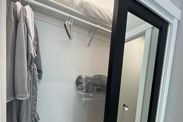 This full sized closet is big enough to accommodate your wardrobe and suitcase during your stay!  You will find 2 robes hanging and extra blankets/linens to use as needed!