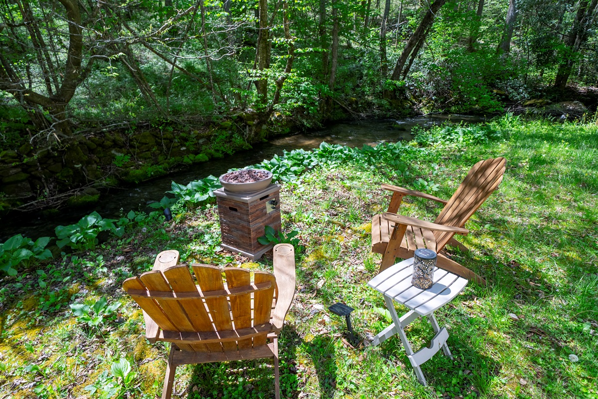 Relax by the propane fire pit while enjoying the sights and sounds of Yellow Creek.