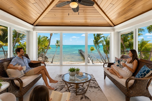 3rd floor living room overlooking ocean.  Nice for reading and relaxing