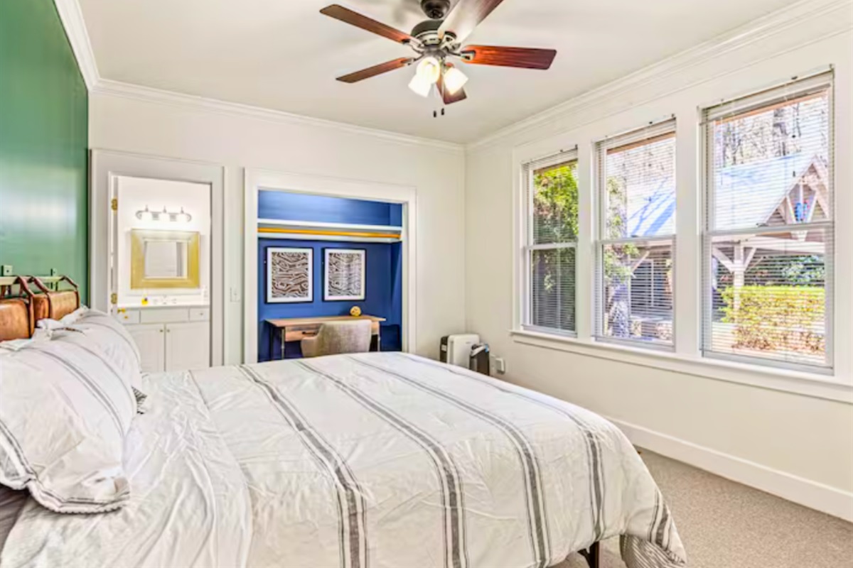 Large Open Windows and Ensuite Bathroom in the Bedroom
