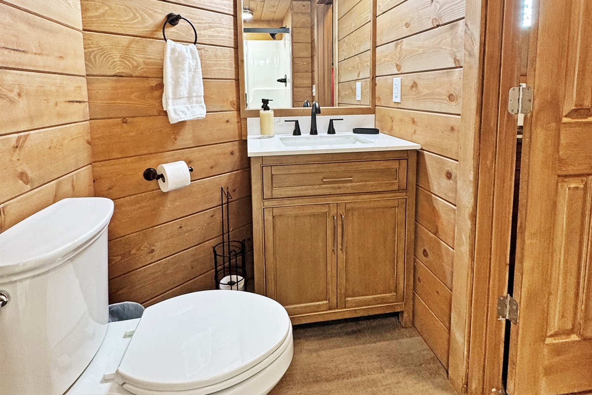 Bathroom Retreat: Bright, modern finishes meet rustic charm in this stylish retreat!