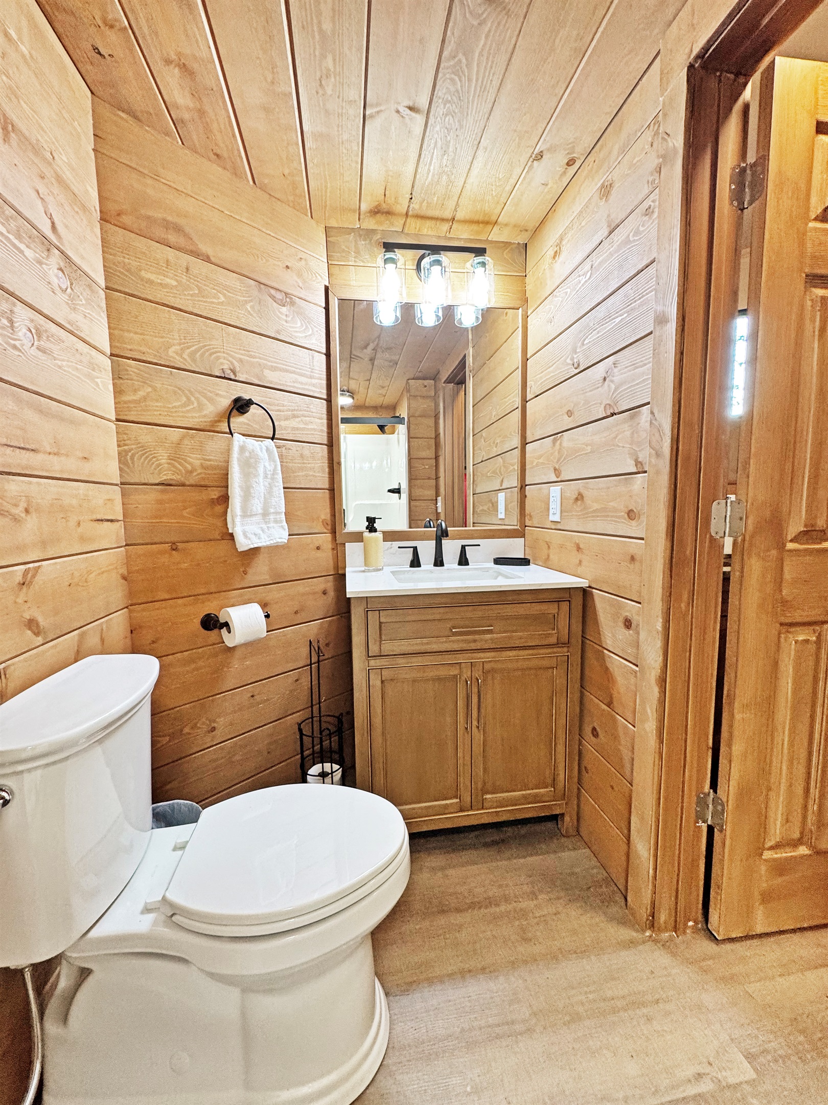 Bathroom Retreat: Bright, modern finishes meet rustic charm in this stylish retreat!