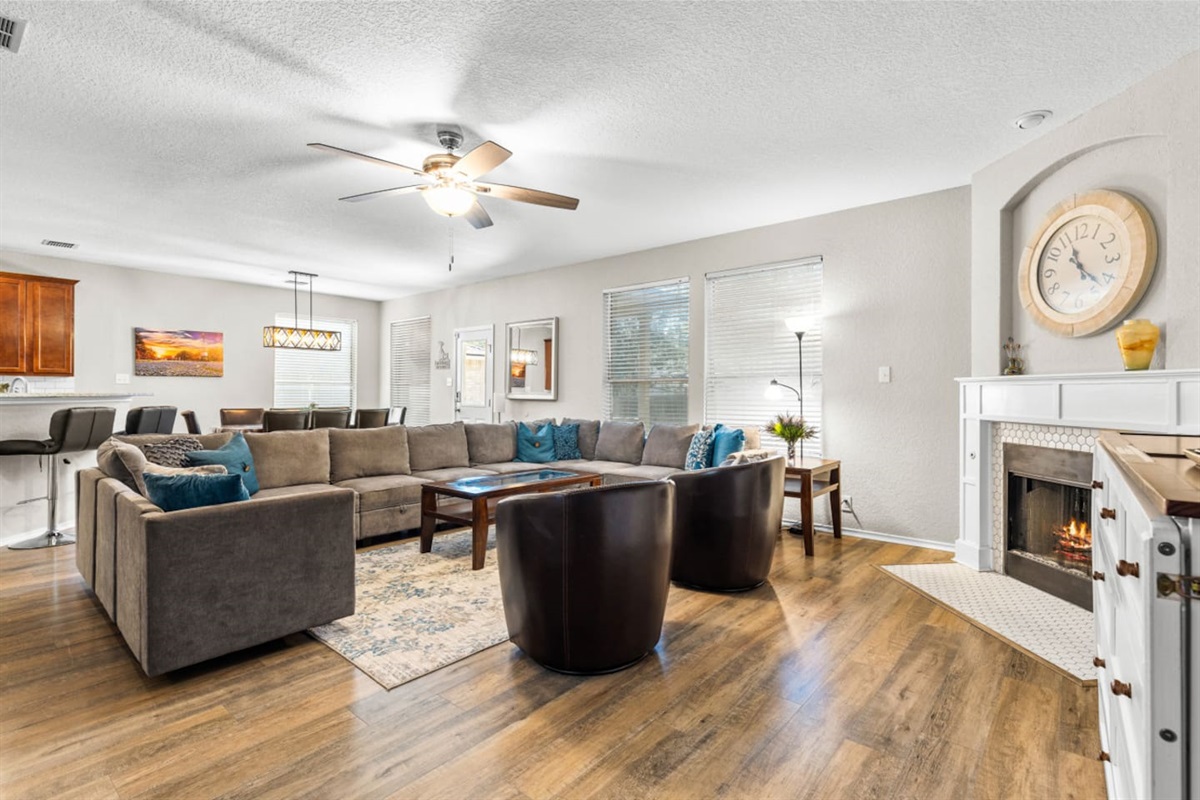 Cozy living area designed for connection, complete with Smart TV streaming, comfortable seating, and a dresser pull-out bed for expanded sleeping space.
