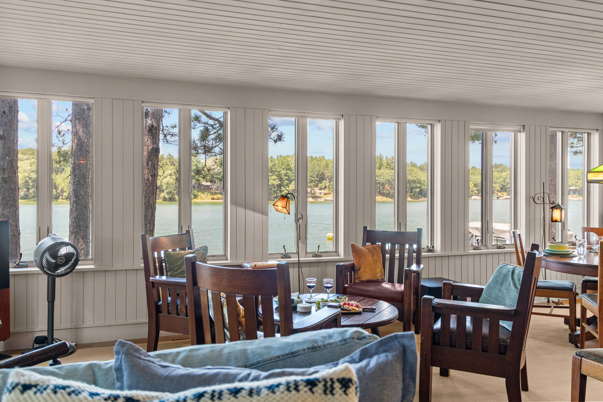 Surrounded by windows and beautiful lake views, this is the perfect spot to slow down, share a meal, and enjoy time together.
