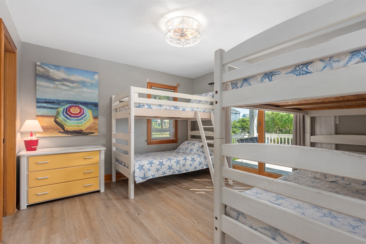 Welcome to Bunk room 1. The there is direct access to the 2nd level deck from this room.