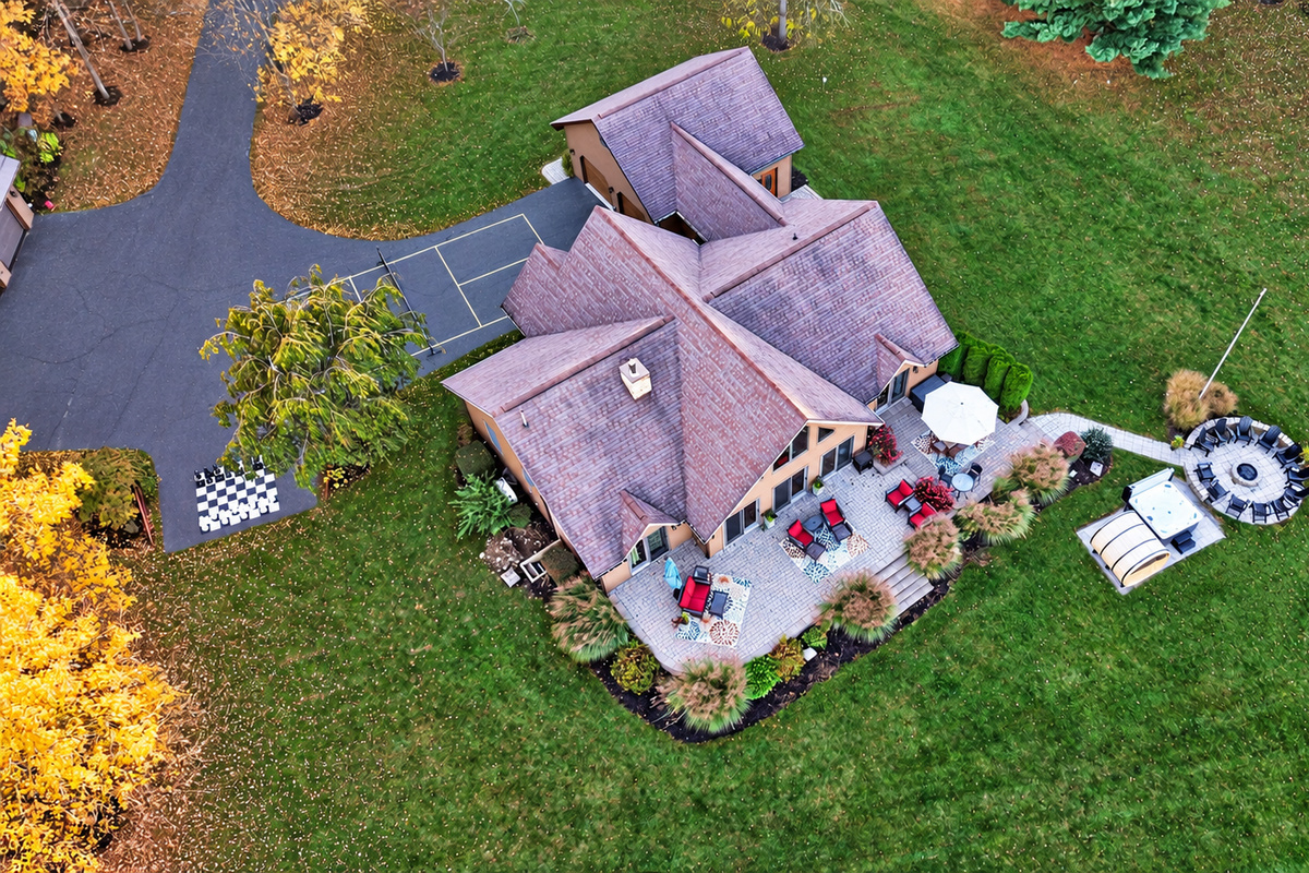 Aerial view of house and outdoor amenities