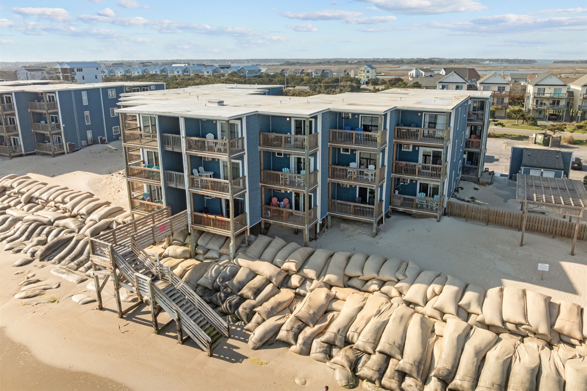 Oceanfront condo building with direct beach access steps away