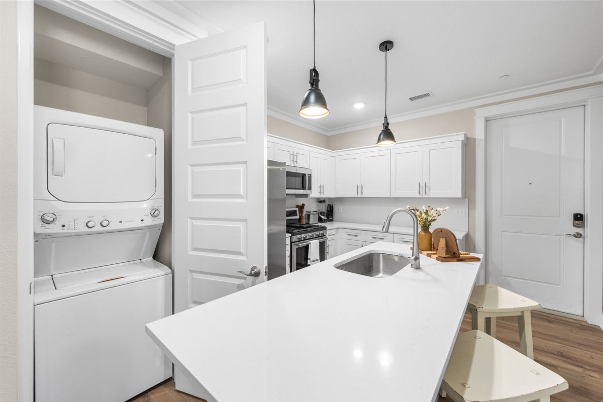 Laundry unit in kitchen