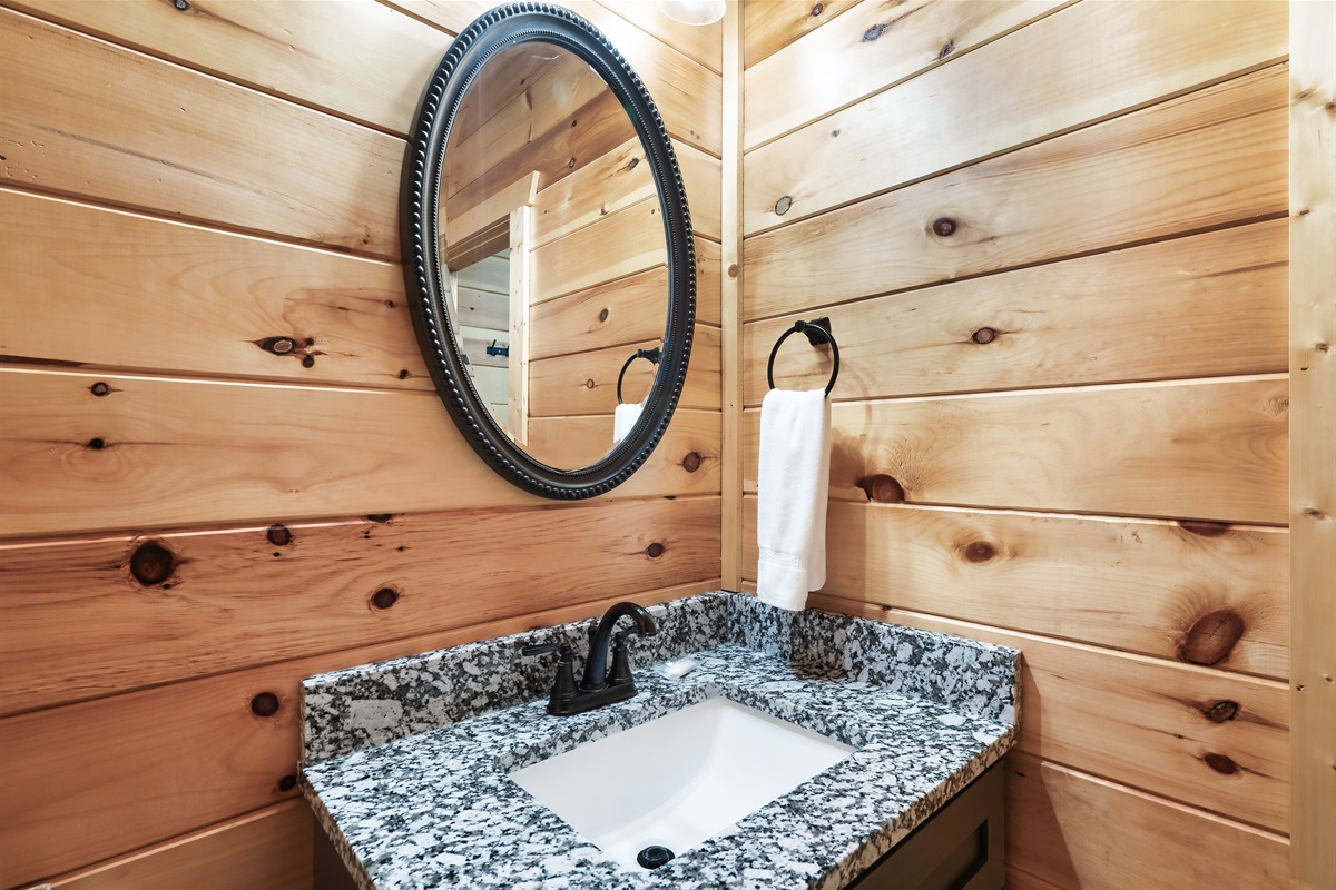 Stylish bathroom perfect for quick refreshes or long soaks.