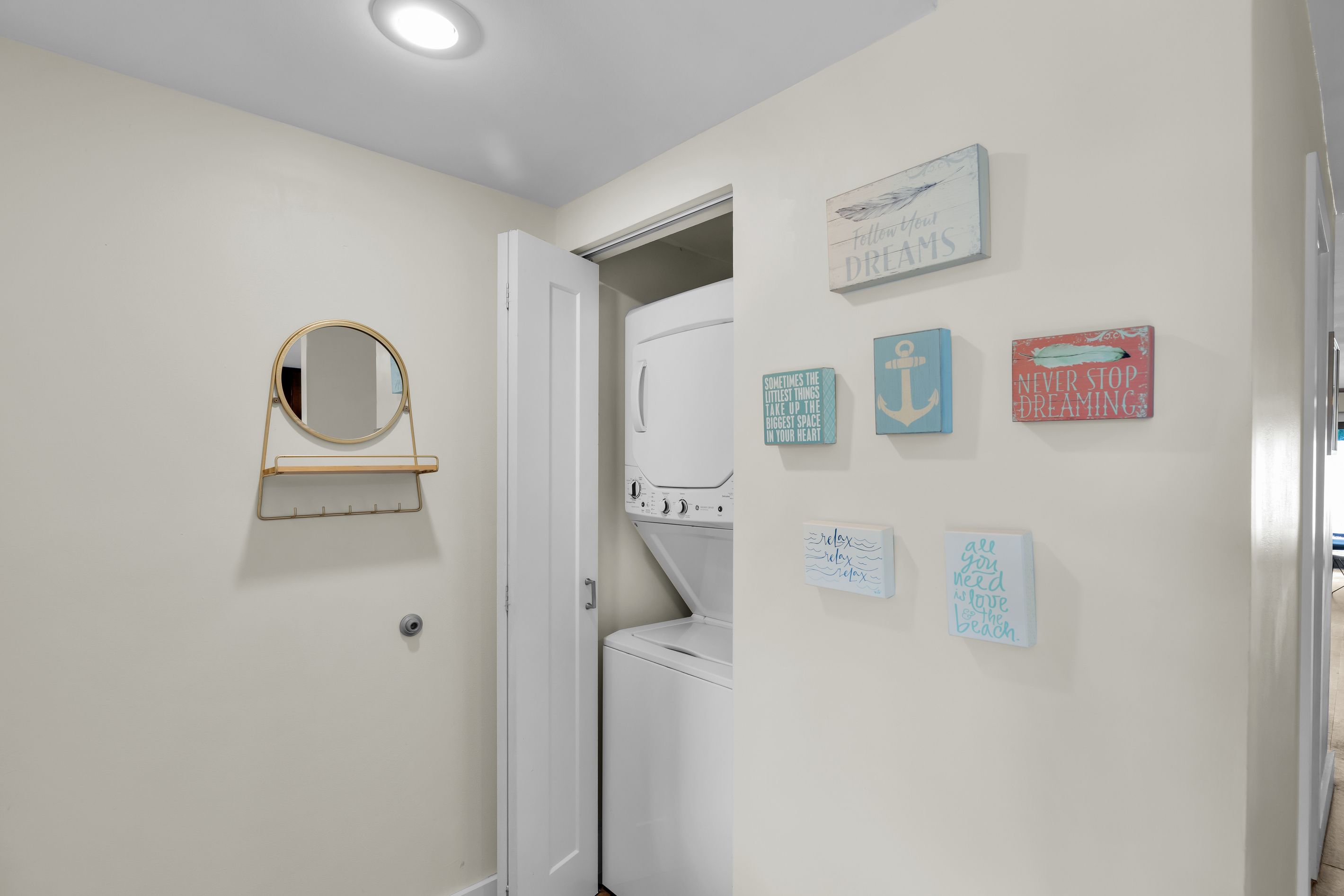 Washer/dryer in home, located off kitchen