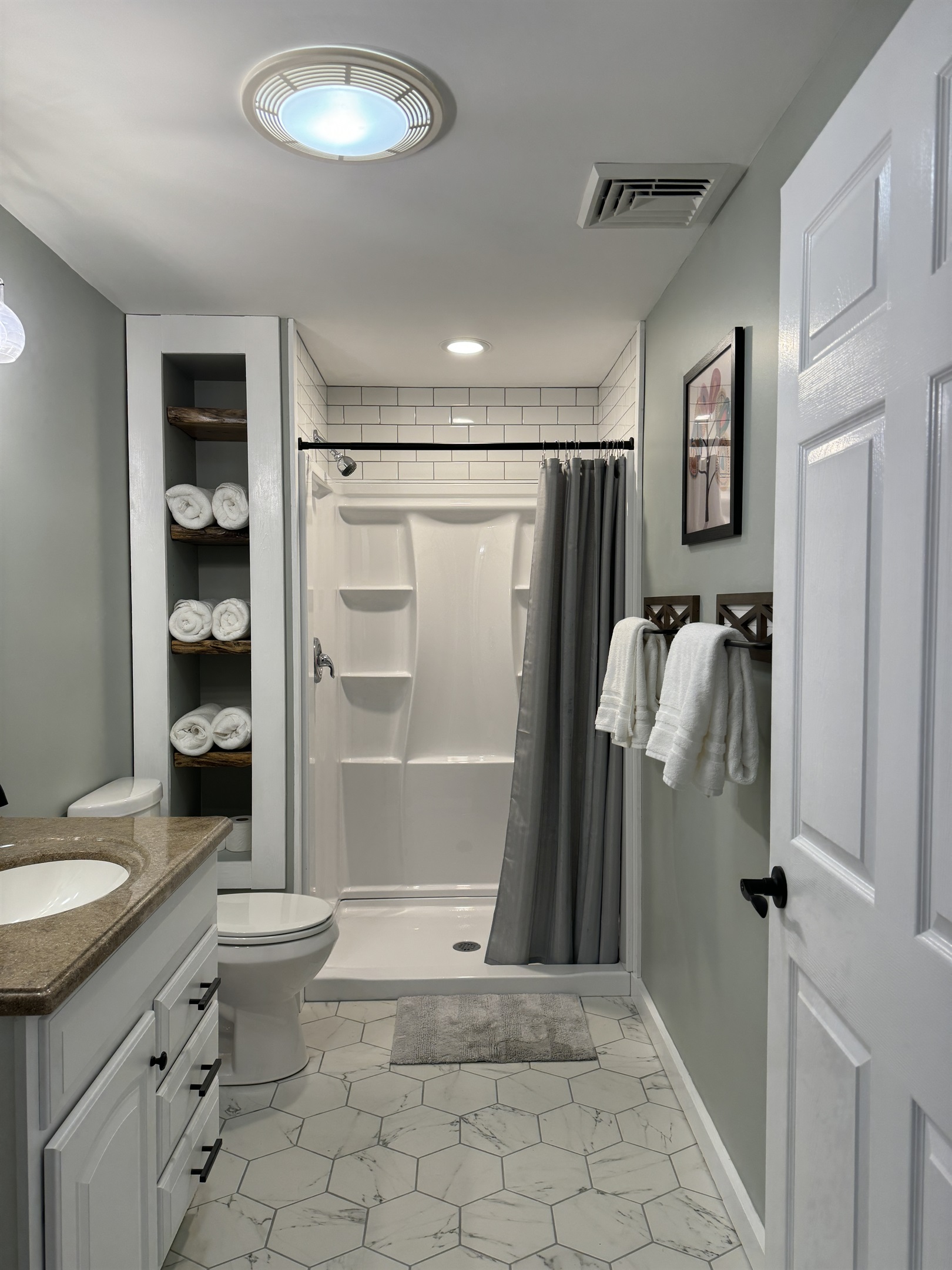 Renovated bathroom with wide shower